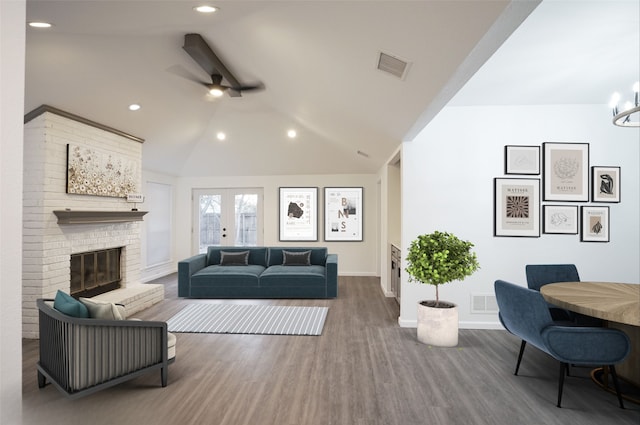 living area with recessed lighting, wood finished floors, visible vents, a fireplace, and ceiling fan