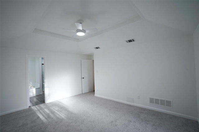 empty room featuring carpet, visible vents, and a ceiling fan