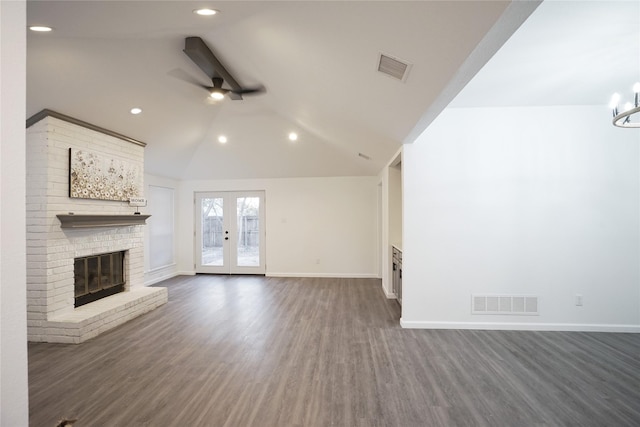 unfurnished living room with recessed lighting, visible vents, a ceiling fan, dark wood-type flooring, and a fireplace