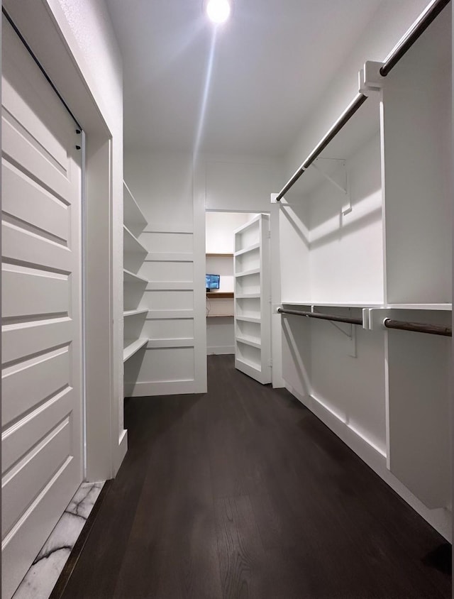 186 Vista Dr, Eustace, TX 75124 - walk in closet featuring wood finished floors