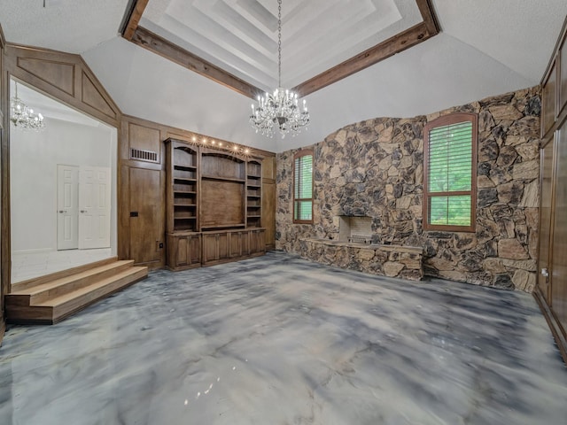 907 Red Oak Creek Dr, Ovilla, TX 75154 - unfurnished living room with a chandelier, concrete flooring, vaulted ceiling, and a textured ceiling