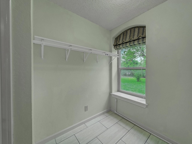 907 Red Oak Creek Dr, Ovilla, TX 75154 - walk in closet with light tile patterned floors