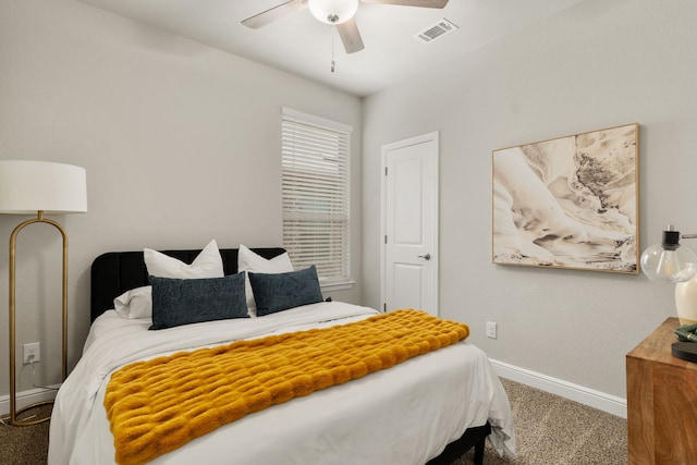 bedroom featuring visible vents, a ceiling fan, carpet flooring, and baseboards