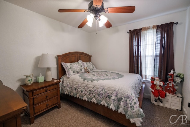 bedroom with a ceiling fan and light carpet