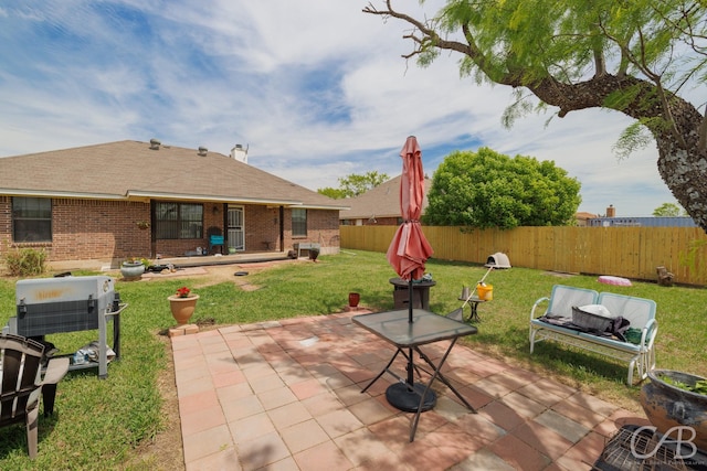 view of patio with a fenced backyard