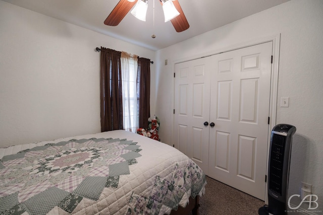 carpeted bedroom with a closet and ceiling fan