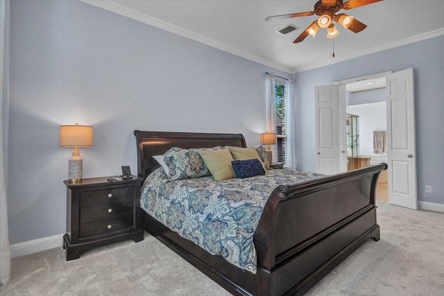 bedroom featuring carpet floors, visible vents, crown molding, and baseboards