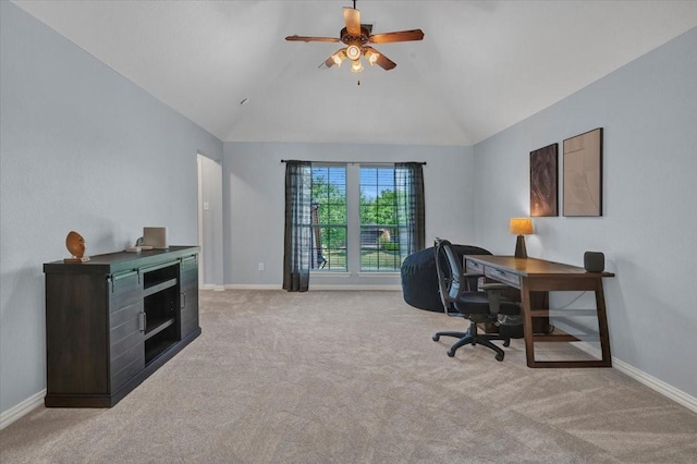 office with lofted ceiling, carpet flooring, and baseboards