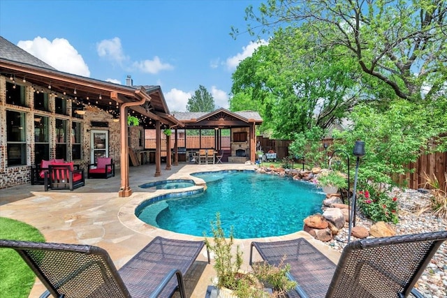 view of swimming pool with a fenced backyard, a gazebo, a patio area, and a pool with connected hot tub