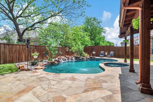 view of pool featuring a fenced backyard, a fenced in pool, an in ground hot tub, and a patio