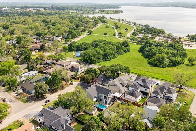 aerial view featuring a residential view and a water view