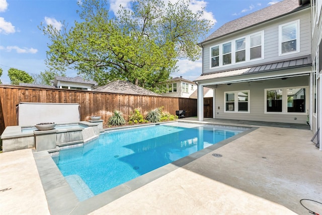 view of pool with a patio area, a fenced backyard, and a fenced in pool