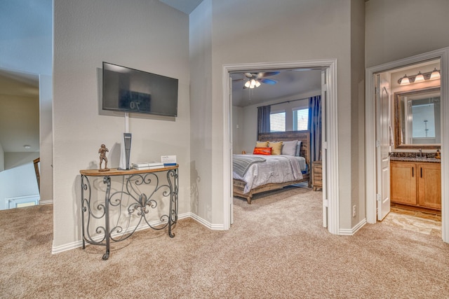 1023 Clydeview Rd, Forney, TX 75126 - carpeted bedroom featuring connected bathroom, baseboards, and a sink