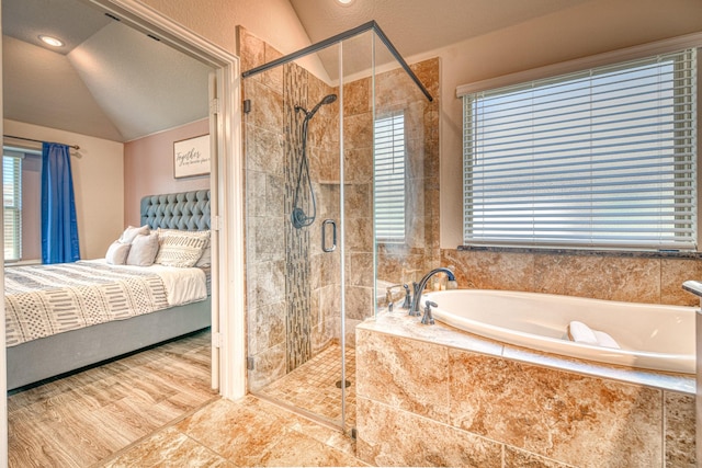 1023 Clydeview Rd, Forney, TX 75126 - full bathroom featuring a bath, ensuite bath, a wealth of natural light, and a stall shower