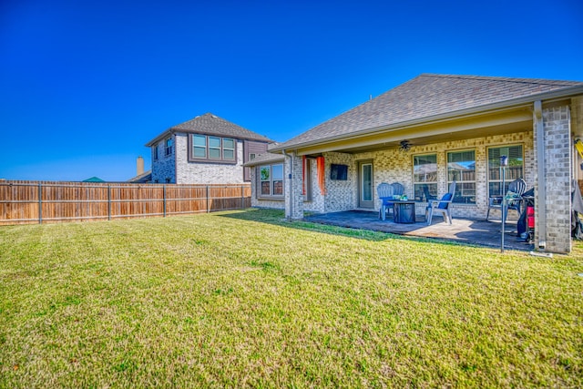 1023 Clydeview Rd, Forney, TX 75126 - rear view of property featuring a patio area, a lawn, a fenced backyard, and ceiling fan