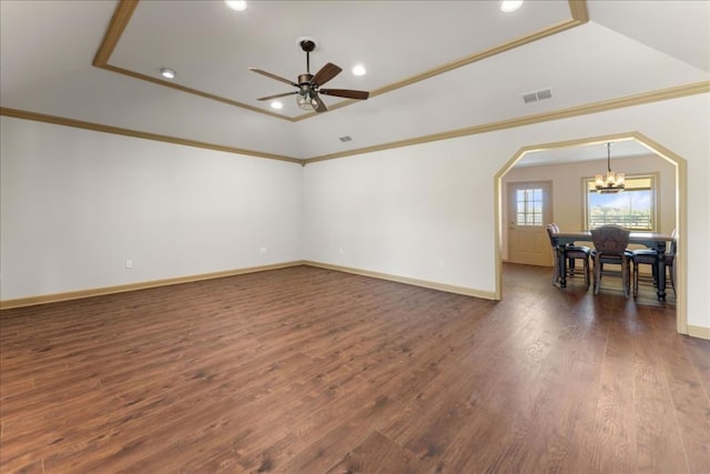 unfurnished room with recessed lighting, dark wood finished floors, visible vents, ornamental molding, and ceiling fan with notable chandelier