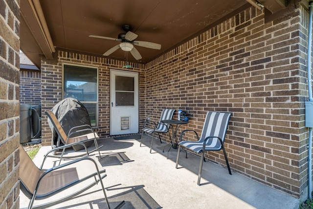 view of patio featuring ceiling fan
