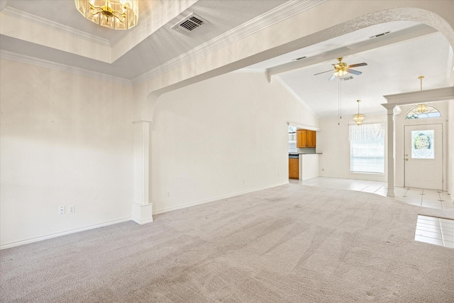 unfurnished living room with light colored carpet, arched walkways, baseboards, and lofted ceiling with beams
