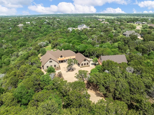 bird's eye view with a forest view