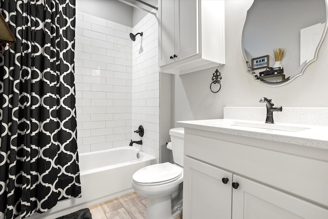 bathroom with vanity, shower / bath combo, toilet, and wood finished floors