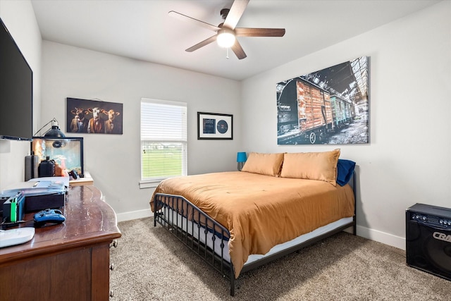 bedroom featuring baseboards, carpet flooring, and ceiling fan