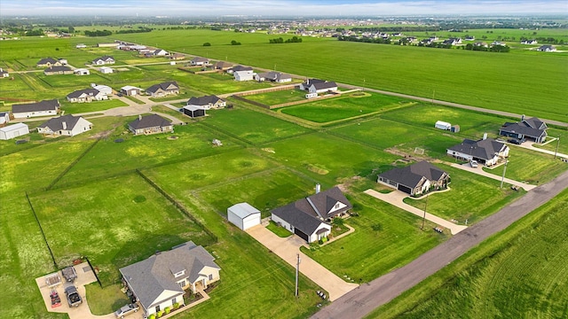 aerial view featuring a rural view and a residential view