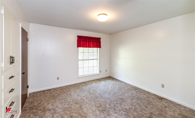 9820 Hillsboro Dr, Shreveport, LA 71118 - unfurnished room with baseboards and carpet flooring