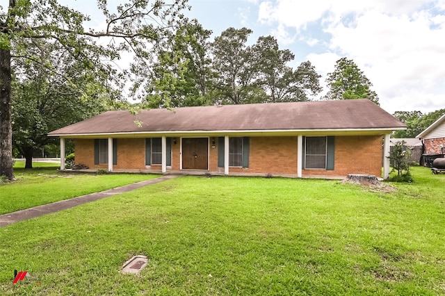 9820 Hillsboro Dr, Shreveport, LA 71118 - ranch-style home with brick siding and a front yard