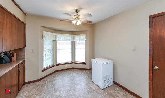 9820 Hillsboro Dr, Shreveport, LA 71118 - laundry area featuring ceiling fan and baseboards