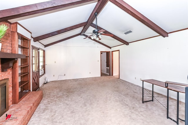9820 Hillsboro Dr, Shreveport, LA 71118 - unfurnished living room featuring a ceiling fan, visible vents, a fireplace, vaulted ceiling with beams, and light carpet