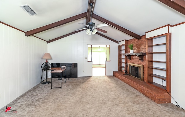 9820 Hillsboro Dr, Shreveport, LA 71118 - carpeted living area with a brick fireplace, ceiling fan, visible vents, and vaulted ceiling with beams