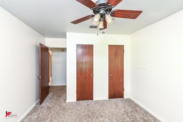 9820 Hillsboro Dr, Shreveport, LA 71118 - unfurnished bedroom with carpet flooring, baseboards, visible vents, and ceiling fan