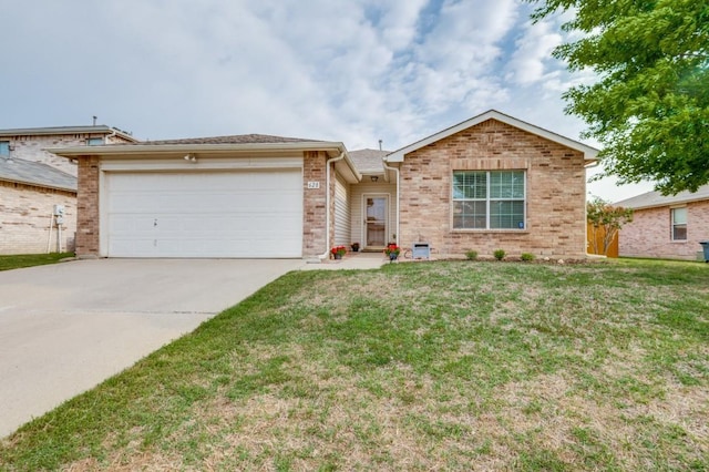 ranch-style home featuring a garage, driveway, a front yard, and brick siding