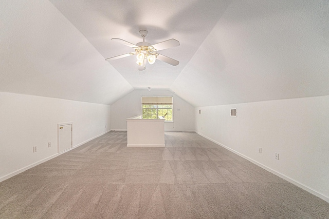 6127 Welden Ct, Fort Worth, TX 76132 - bonus room with baseboards, vaulted ceiling, and light colored carpet