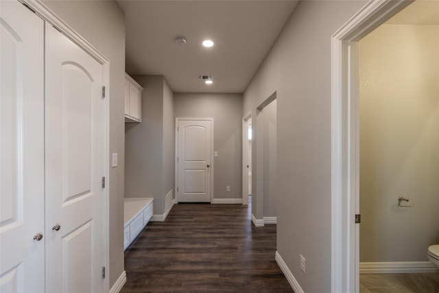 2567 Fm 368, Iowa Park, TX 76367 - corridor featuring recessed lighting, dark wood finished floors, visible vents, and baseboards