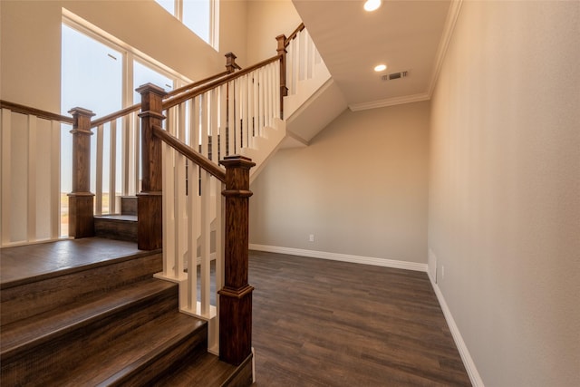 2567 Fm 368, Iowa Park, TX 76367 - staircase featuring crown molding, wood finished floors, baseboards, visible vents, and recessed lighting