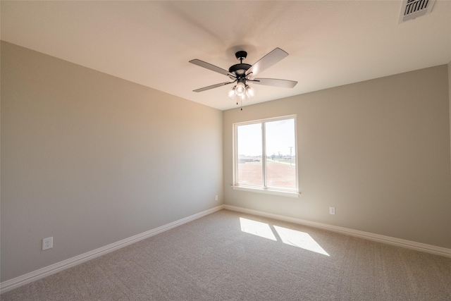 2567 Fm 368, Iowa Park, TX 76367 - unfurnished room with ceiling fan, baseboards, visible vents, and carpet