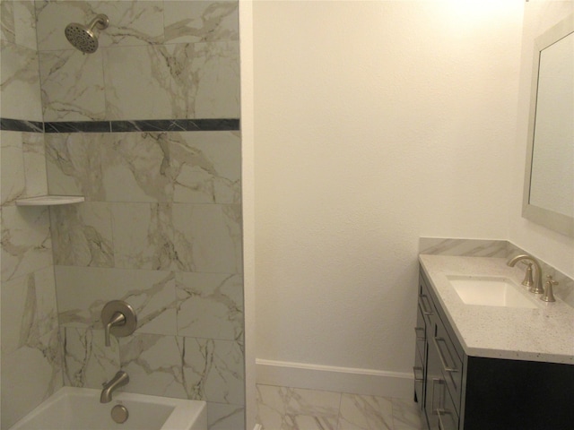 415 Easy St, Marlin, TX 76661 - full bathroom featuring baseboards, marble finish floor, vanity, and shower / washtub combination