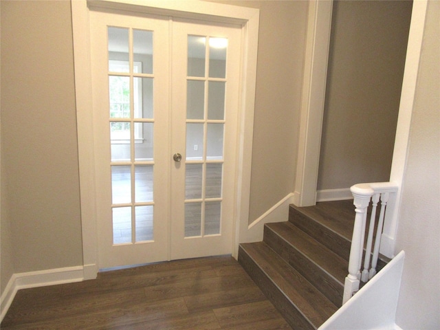 415 Easy St, Marlin, TX 76661 - doorway with dark wood-type flooring, stairway, baseboards, and french doors