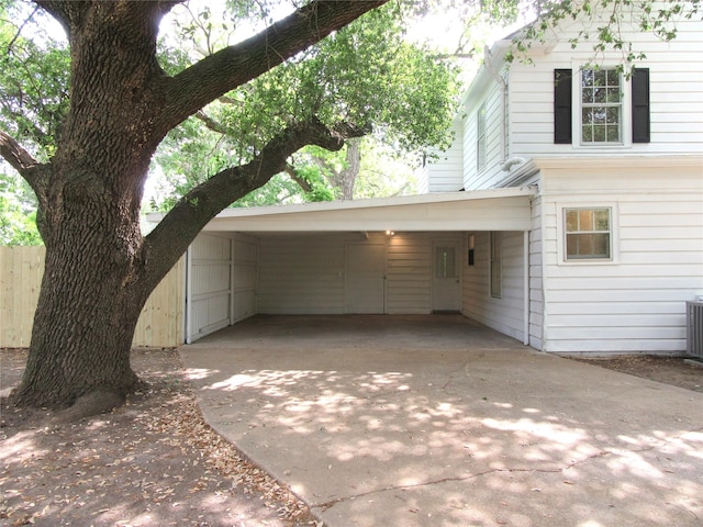 415 Easy St, Marlin, TX 76661 - view of home's exterior with concrete driveway and fence