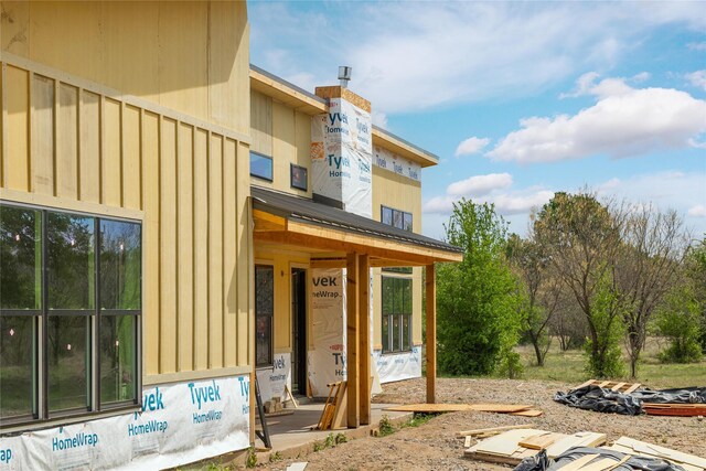 exterior space featuring board and batten siding