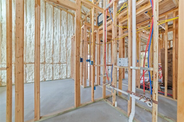 misc room featuring a healthy amount of sunlight and concrete flooring