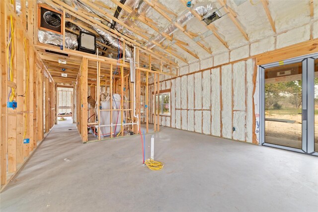 misc room with unfinished concrete floors