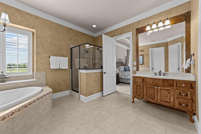 ensuite bathroom featuring a shower stall, a garden tub, crown molding, vanity, and ensuite bath