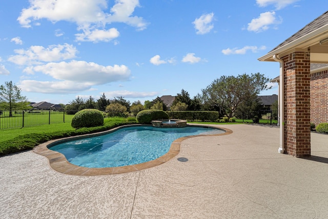 view of pool featuring a patio area, a lawn, a pool with connected hot tub, and fence