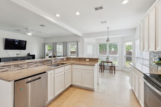 kitchen with recessed lighting, stainless steel appliances, visible vents, and a sink