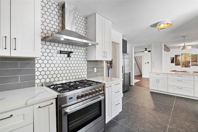 2744 Bay Meadows Ct, Farmers Branch, TX 75234 - kitchen with wall chimney range hood, stainless steel appliances, white cabinetry, and backsplash