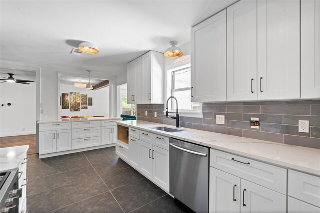 2744 Bay Meadows Ct, Farmers Branch, TX 75234 - kitchen with dishwasher, a sink, backsplash, and white cabinets