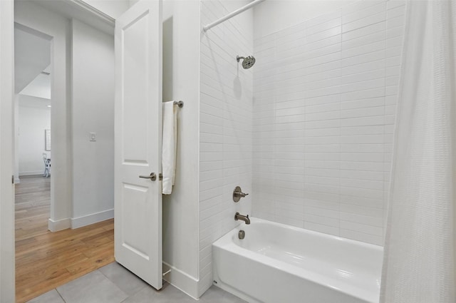 1109 Mountain View Dr, Weatherford, TX 76087 - bedroom featuring visible vents, ensuite bathroom, and light wood-style floors