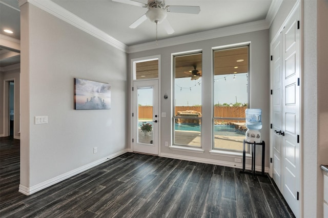 5124 Cathedral Ln, Wichita Falls, TX 76310 - doorway to outside with ornamental molding, baseboards, a ceiling fan, and dark wood-style flooring